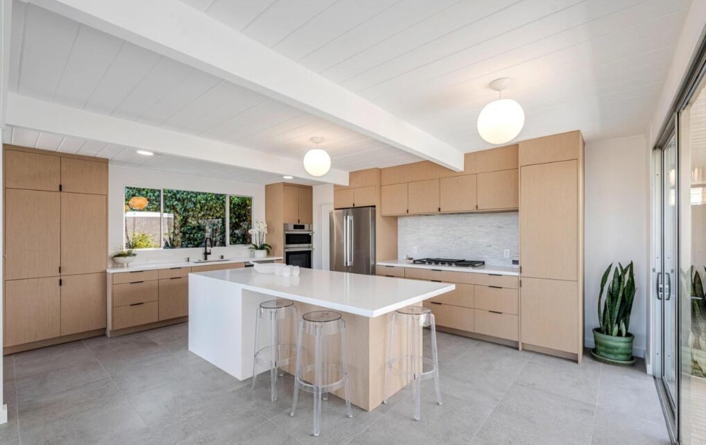 Shinnoki Ivory Oak kitchen with pocket door pantry — DodiHome project