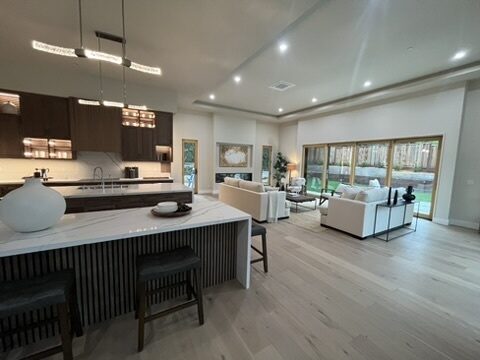 Custom walnut kitchen cabinets with fluted island detail — DodiHome project