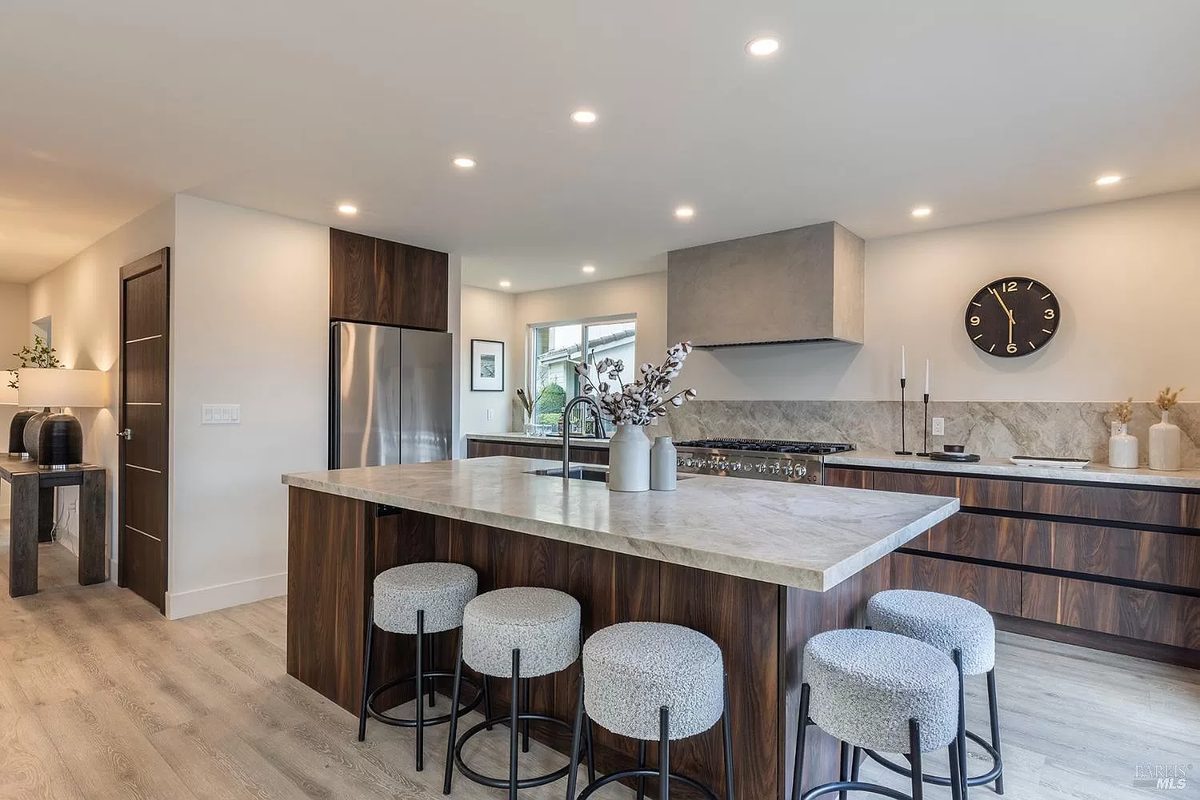 Third finished-room view of walnut kitchen & vanity in napa cabinetry and surrounding surfaces
