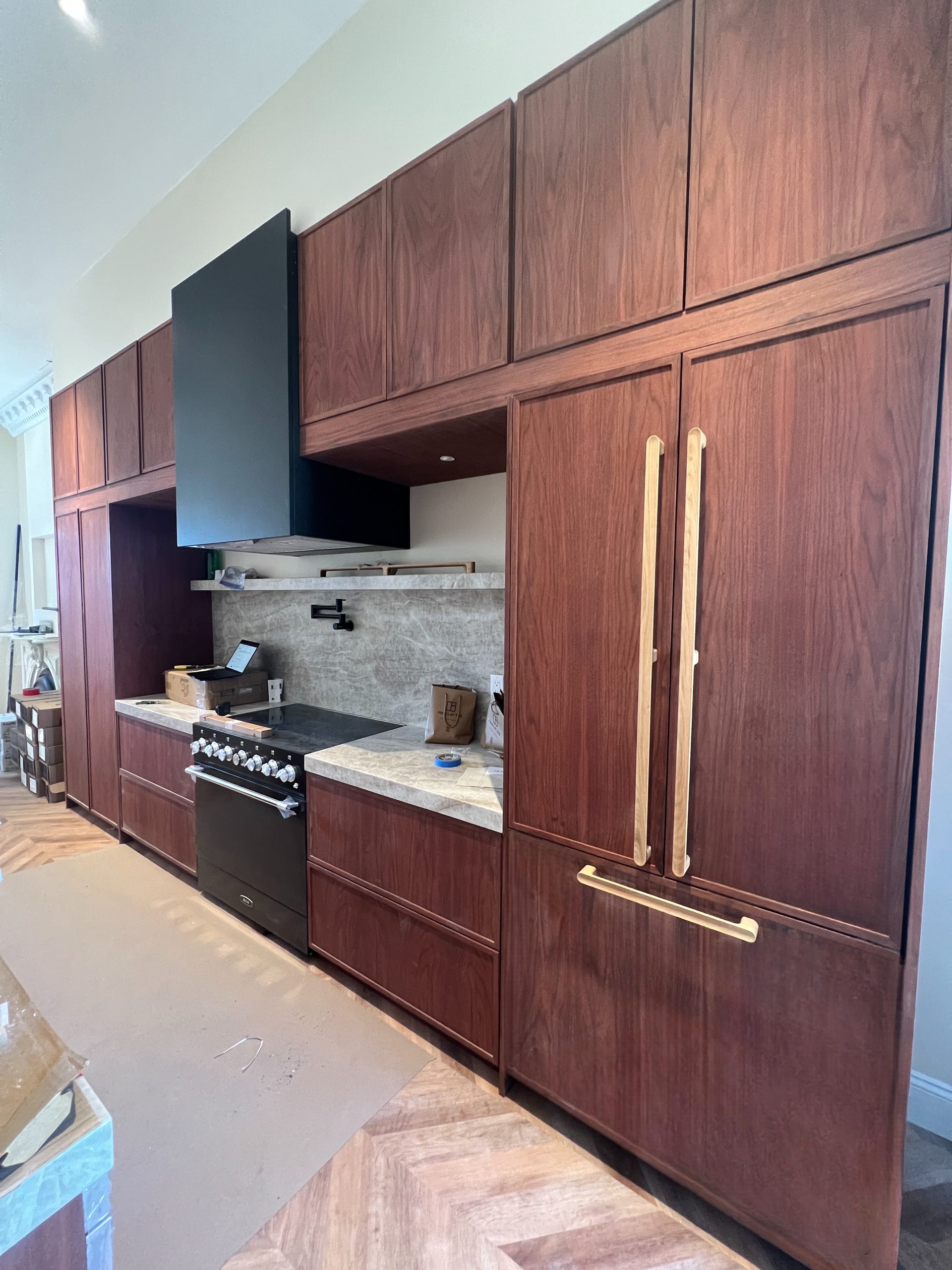 Primary finished-room view of warm oak kitchen in oakland cabinetry and surrounding surfaces