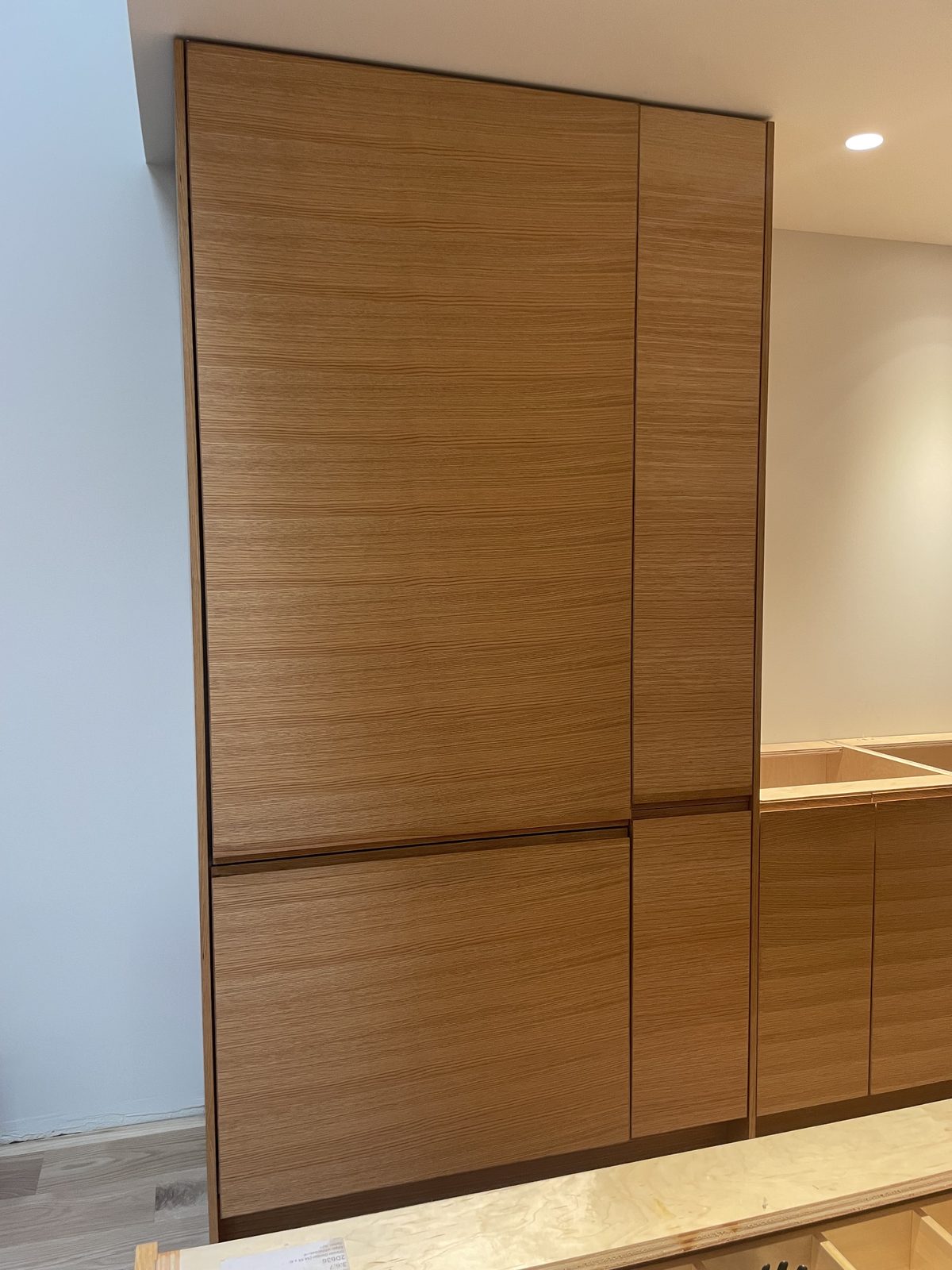 Third finished-room view of light oak kitchen in san carlos cabinetry and surrounding surfaces