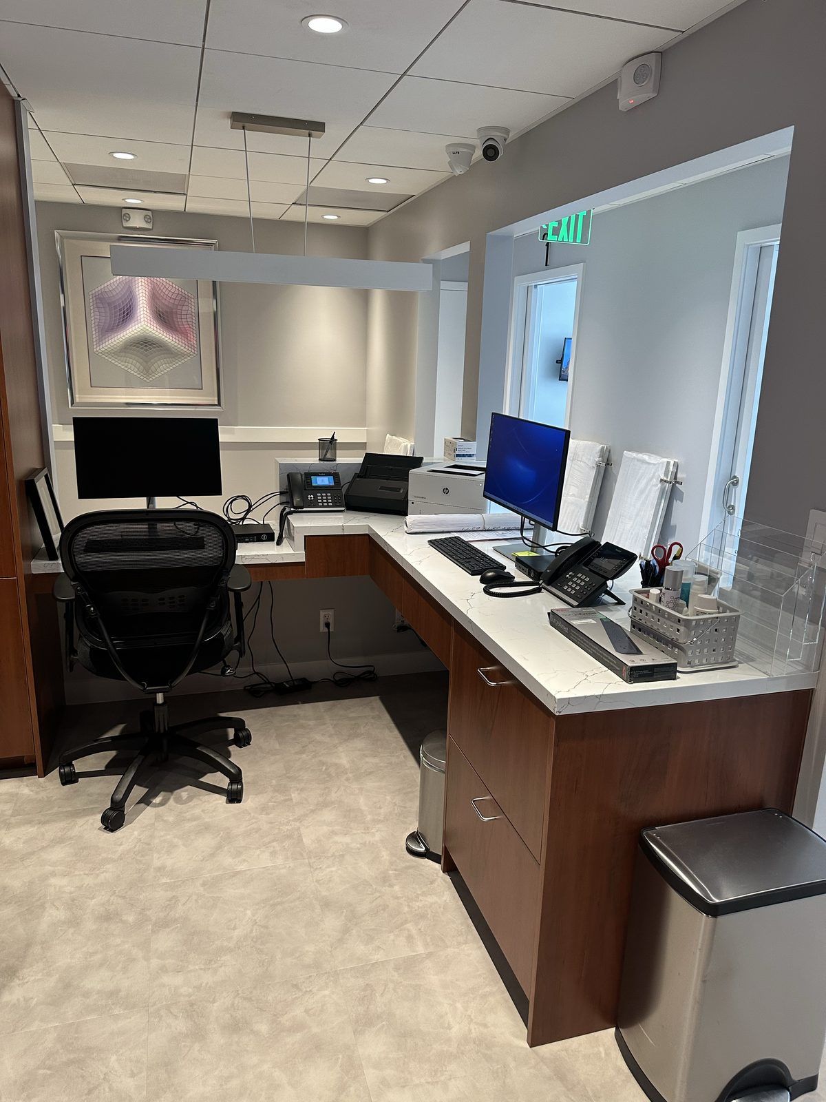 Second finished-room view of walnut office cabinetry and surrounding surfaces in San Francisco