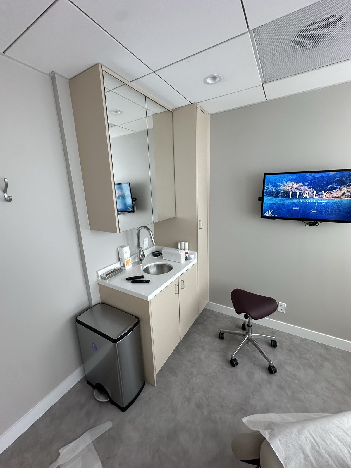 Fourth finished-room view of walnut office cabinetry and surrounding surfaces in San Francisco