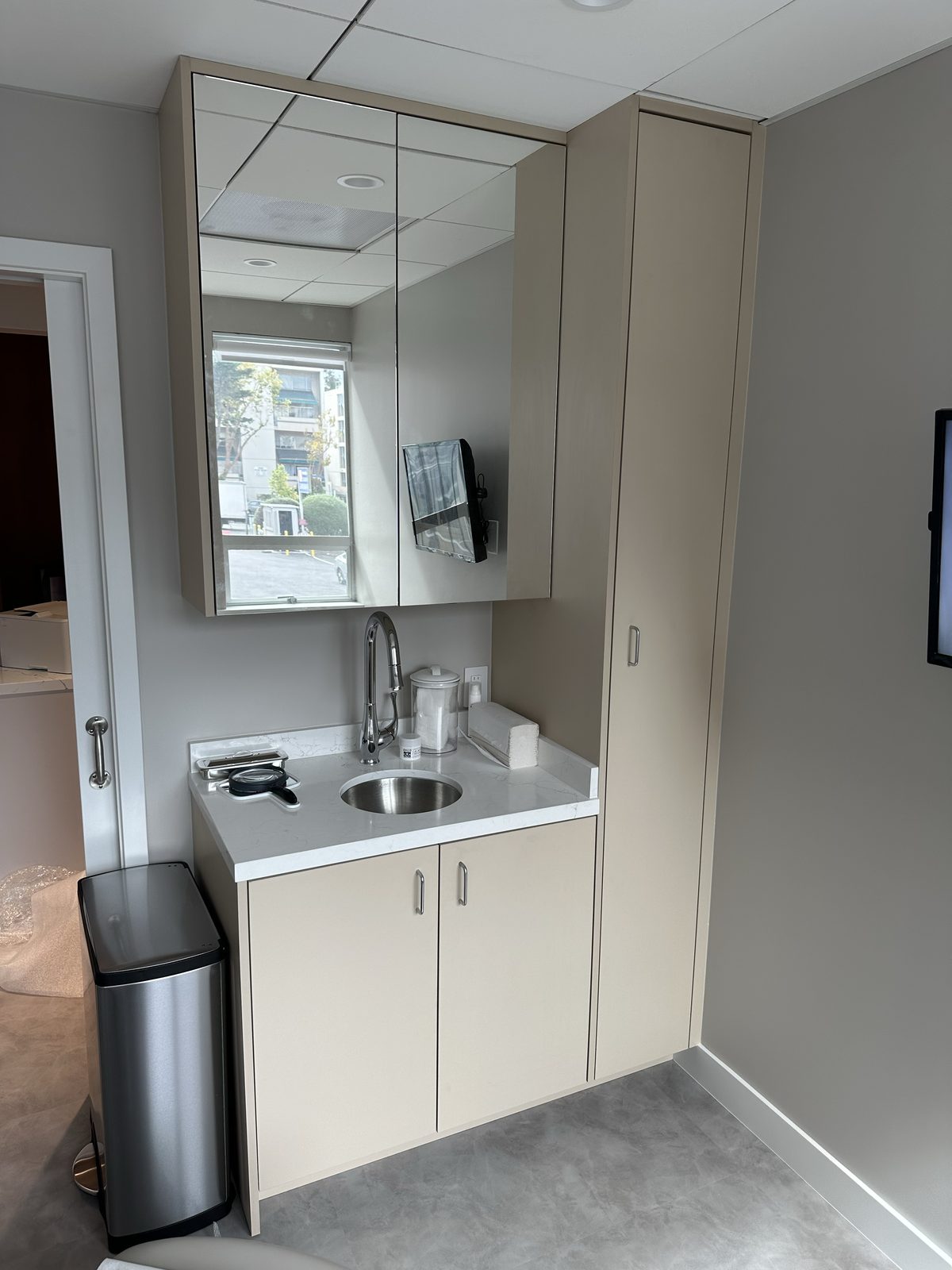 Fifth finished-room view of walnut office cabinetry and surrounding surfaces in San Francisco