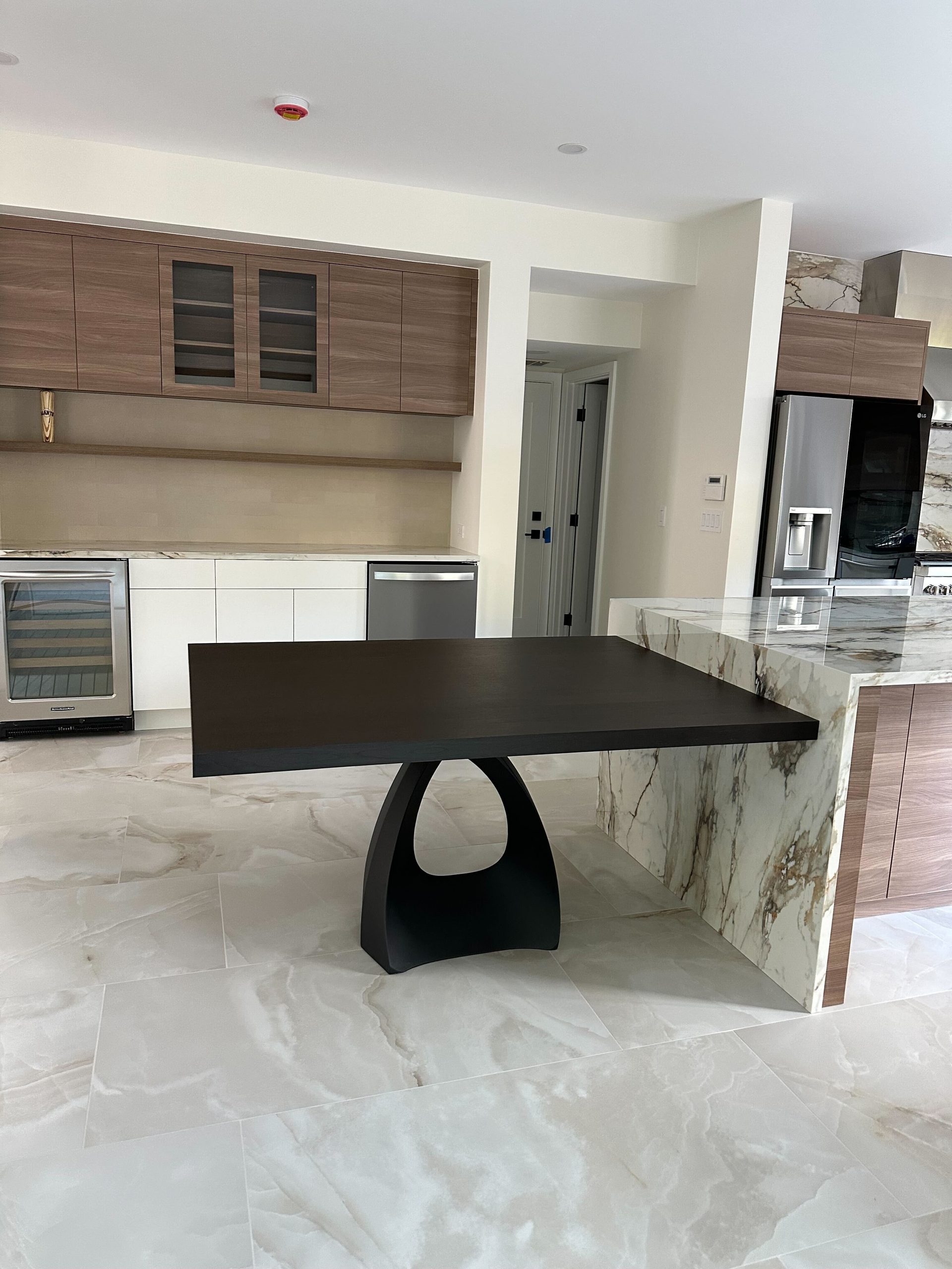 Primary finished-room view of two-tone kitchen & built-ins cabinetry and surrounding surfaces