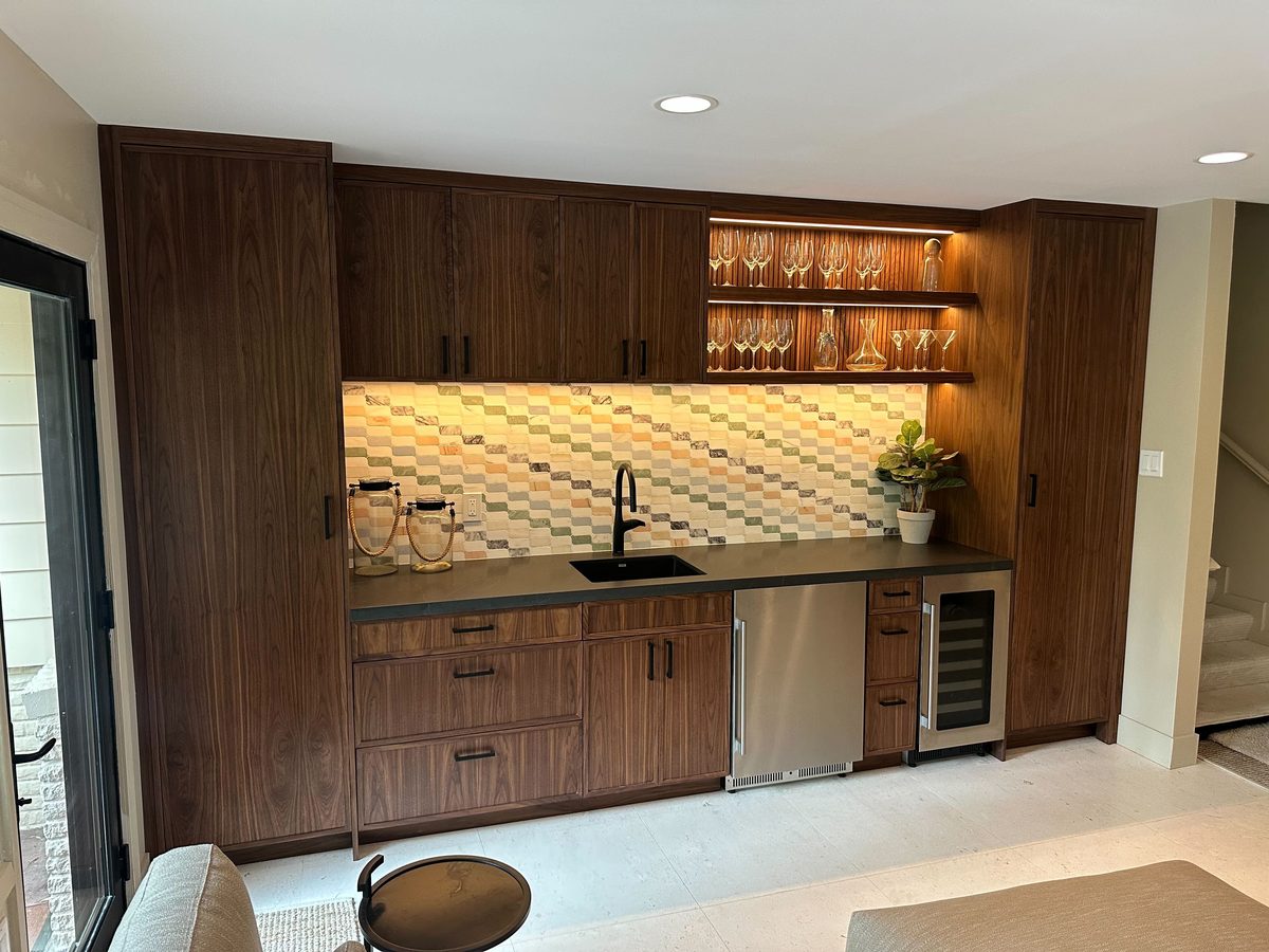 Second finished-room view of walnut kitchen, bar & home office cabinetry and surrounding surfaces