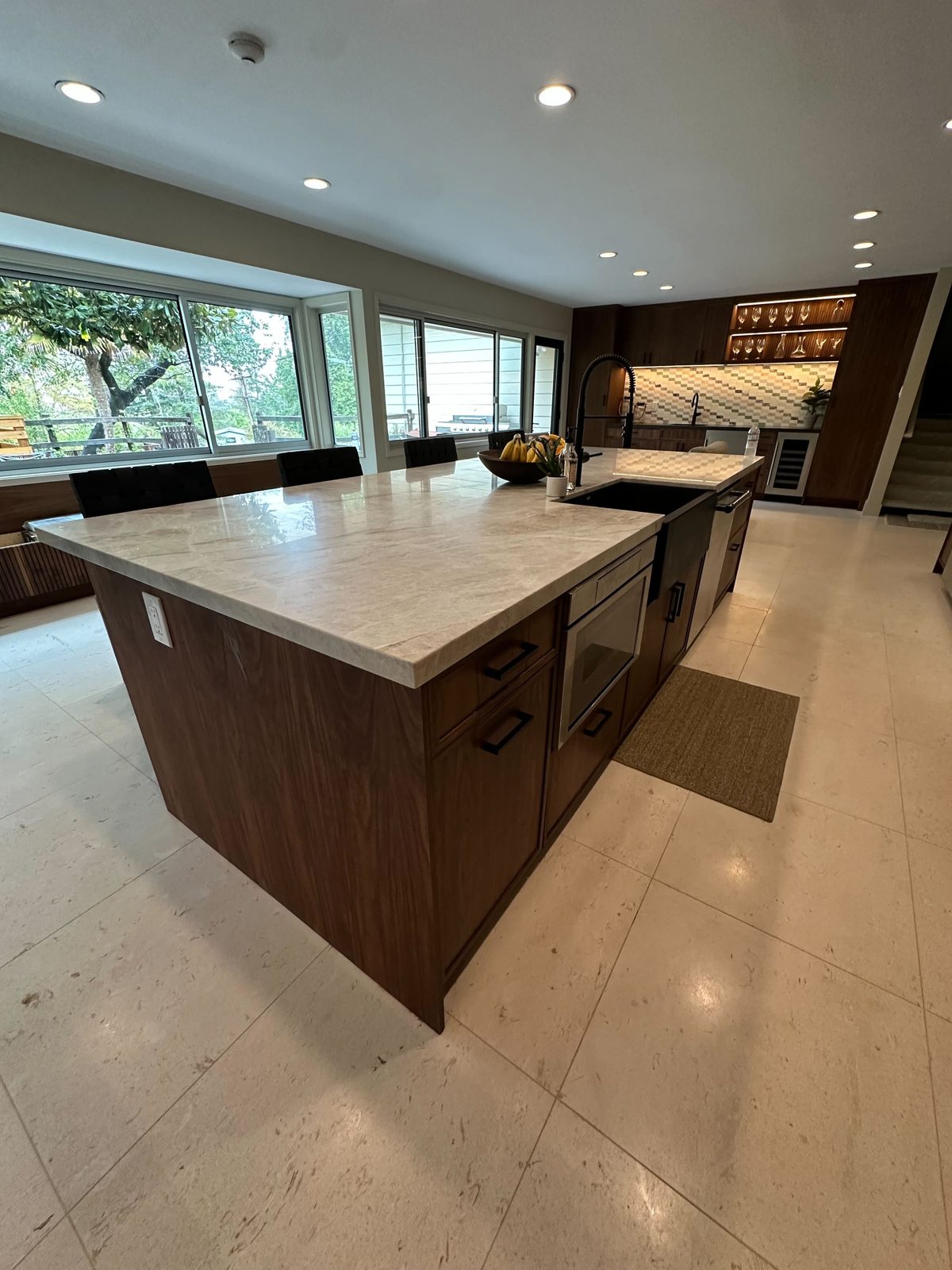 Fourth finished-room view of walnut kitchen, bar & home office cabinetry and surrounding surfaces