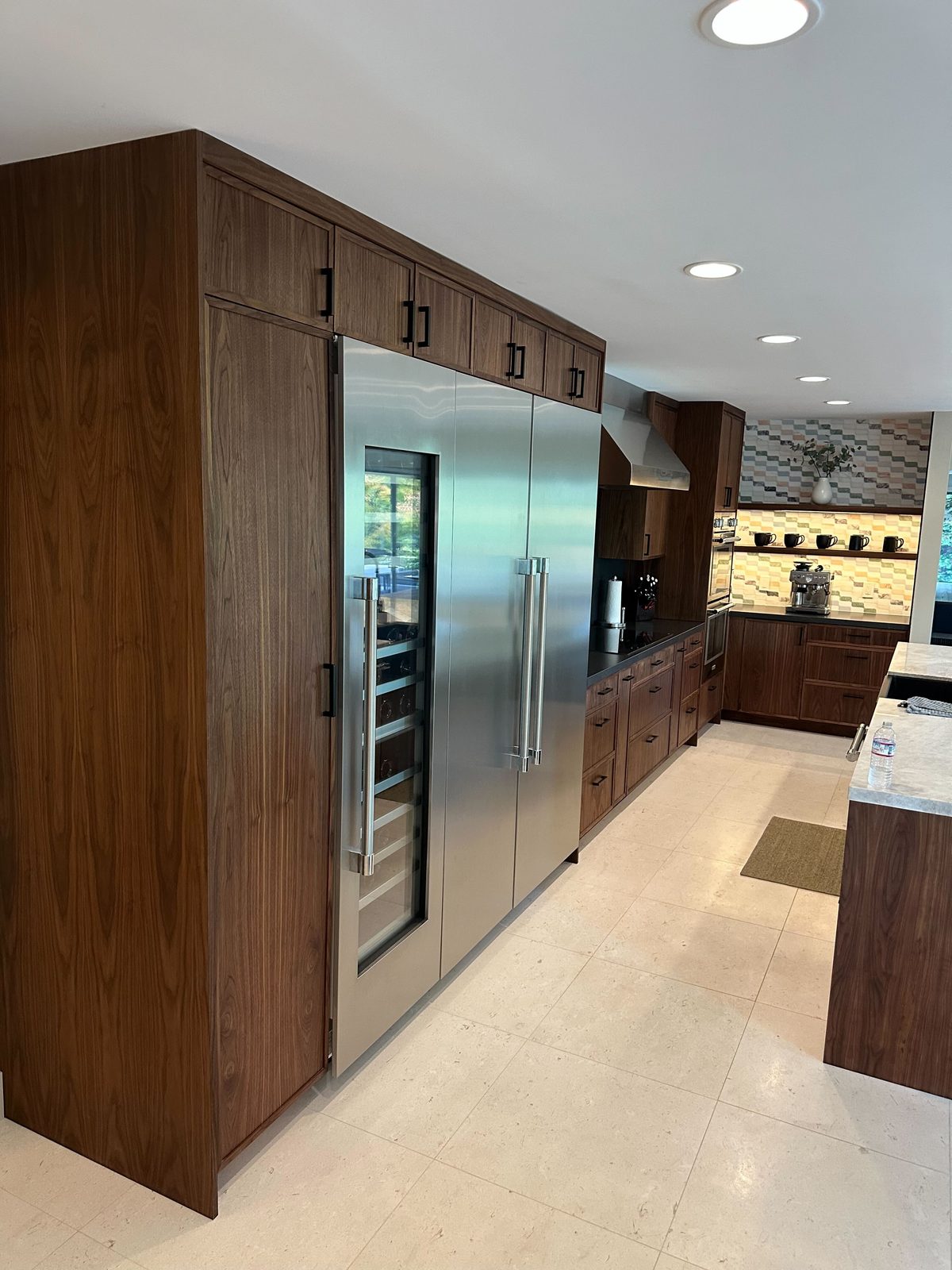Fifth finished-room view of walnut kitchen, bar & home office cabinetry and surrounding surfaces